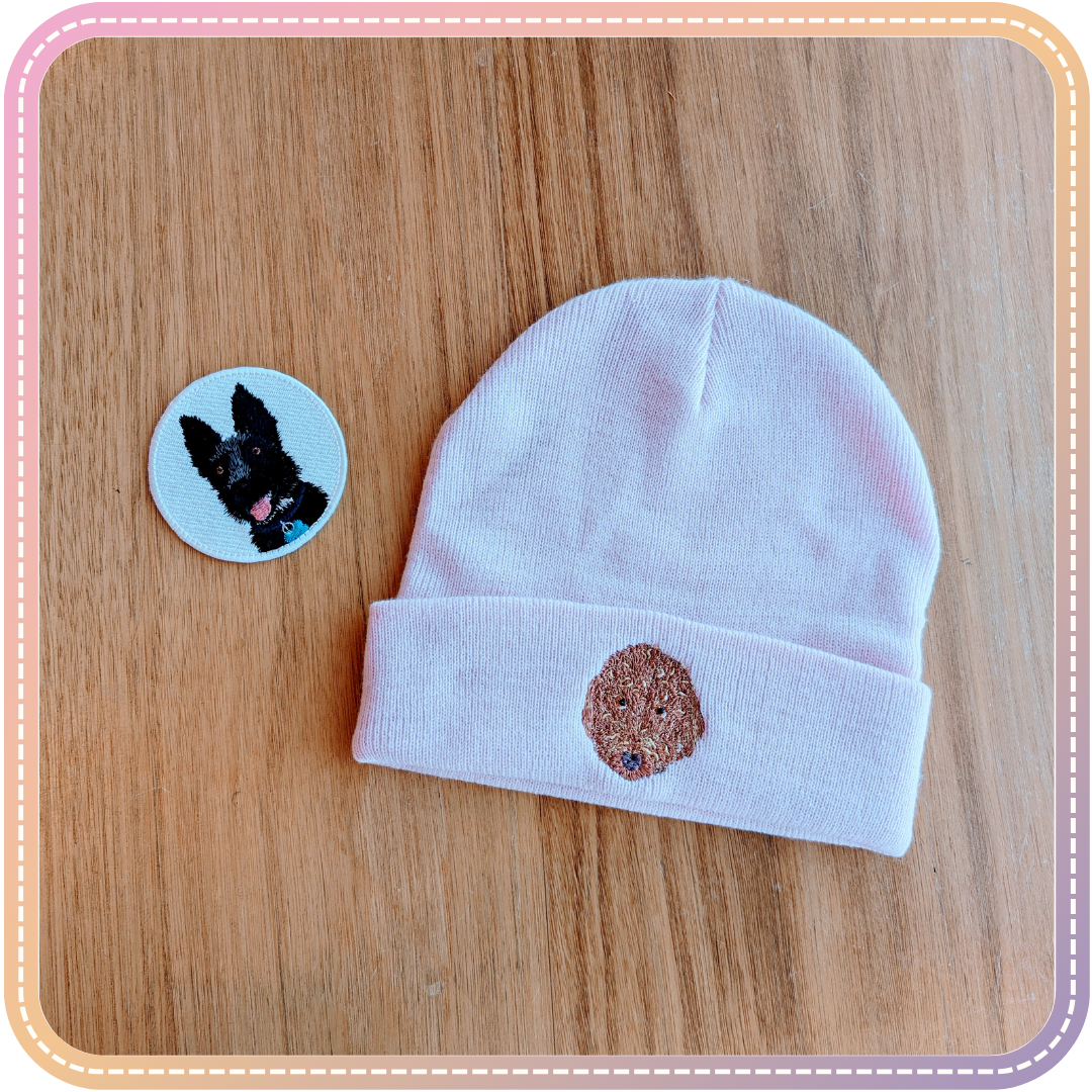 pink beanie and patch with different dogs embroidered