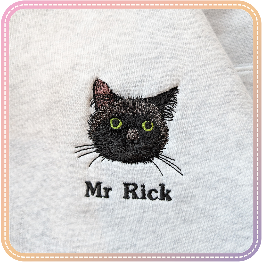 close up of black cat embroidery