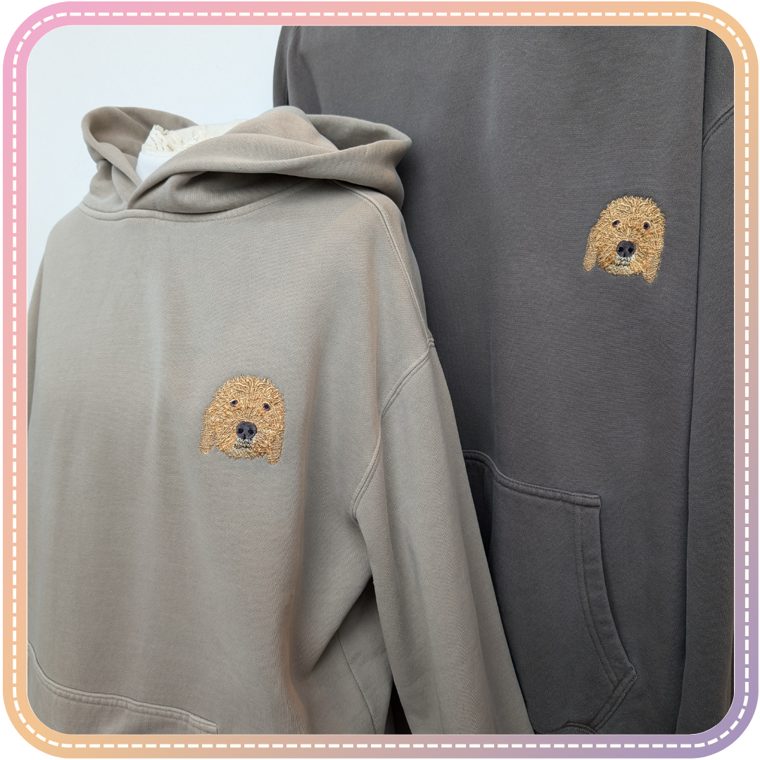 two hoodies with a poodle embroidered over the heart