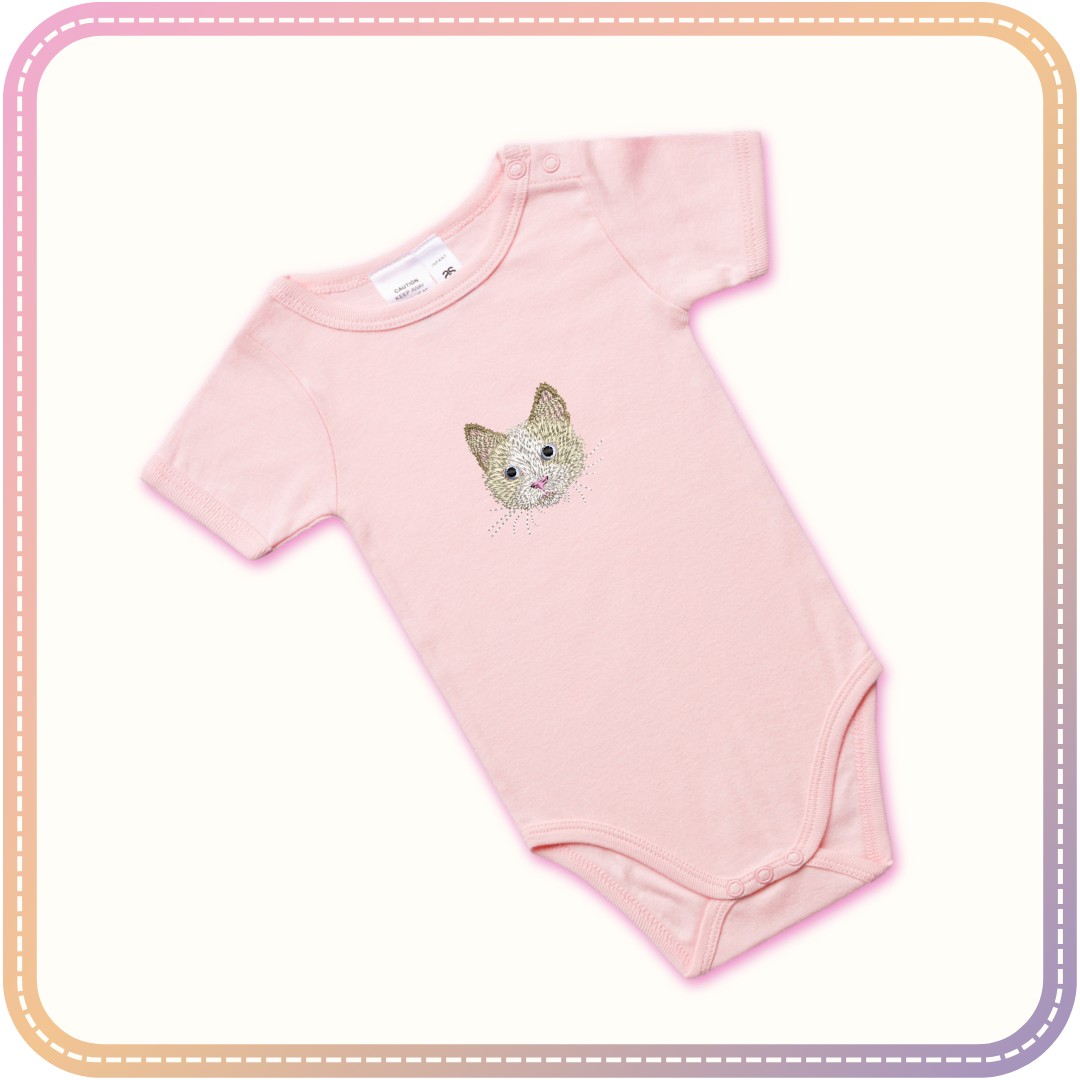 mockup of a pink baby onesie with a cat embroidered in the centre
